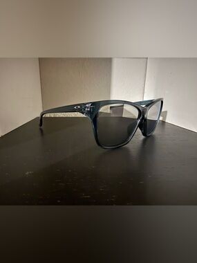 Oakley Transparent Gray Frame Sunglasses with Dark Gray Lenses